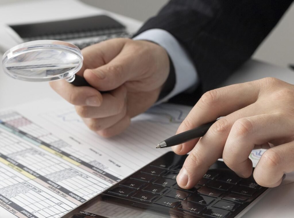 business-man-calculating-finance-numbers